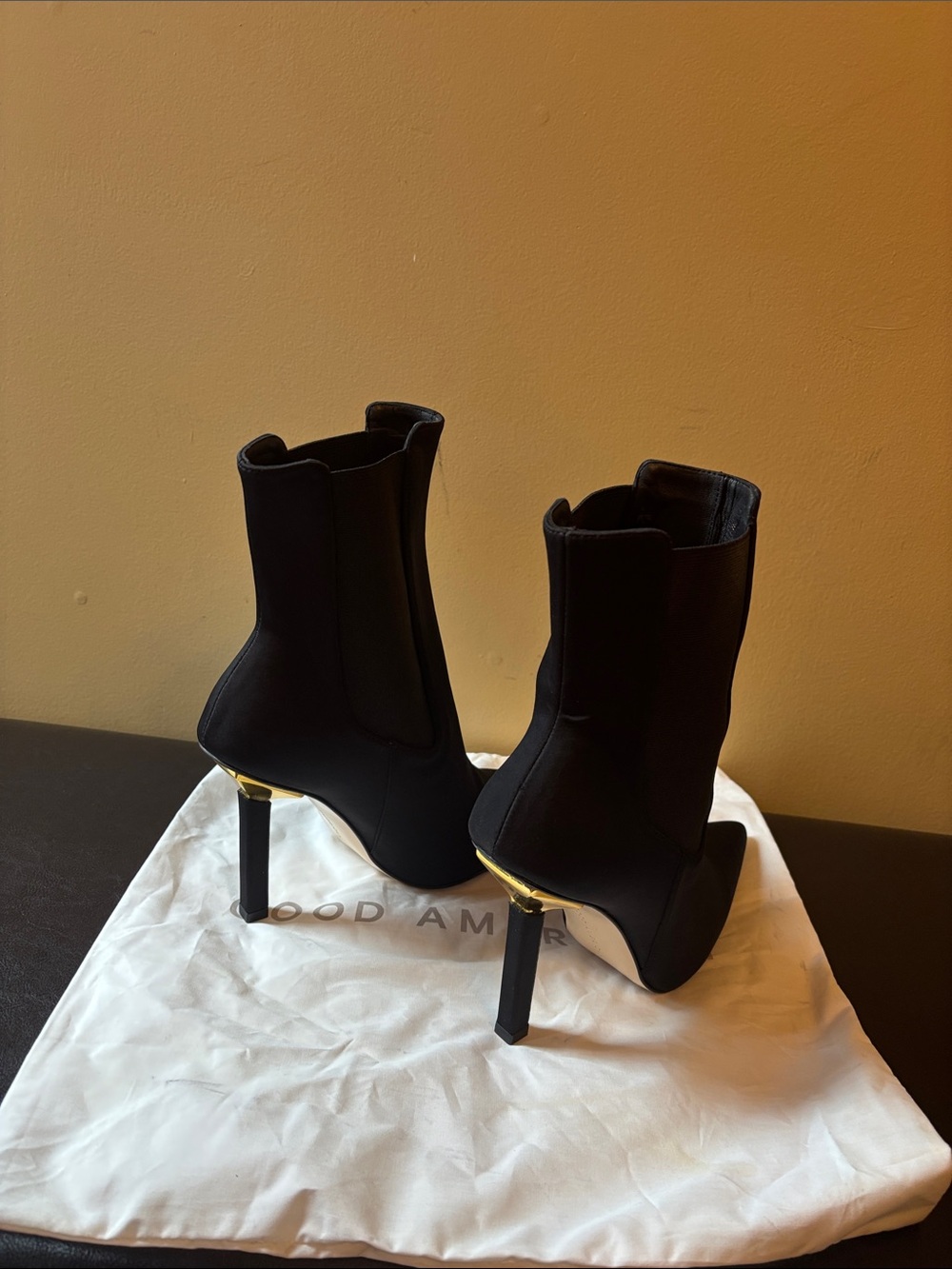 Good American Black High-Heel Chelsea Booties with Gold Trim